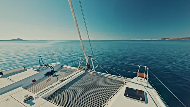 WS Trampoline of a catamaran sailing in the bay