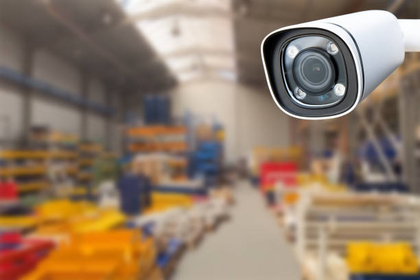 istock CCTV Camera or surveillance operating inside industrial factory. Copy space. 1493742753