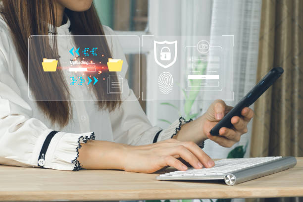 istock businessman upload documents from computer to backup online cloud and download copy file data from cloud network for make work in office or from home. cybersecurity concept Global network security. 1493746832