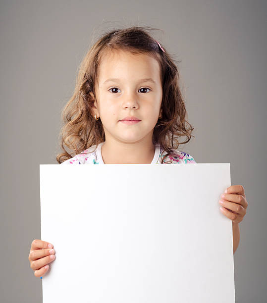 istock Little girl holding white board. 149375986