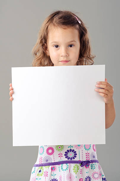 istock Little girl holding white board. 149375991
