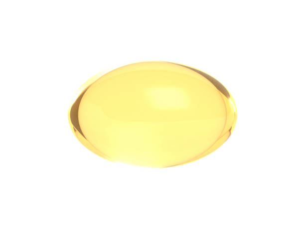 istock Fish oil capsule. Omega 3. Supplement pill. Gold. 1493761066