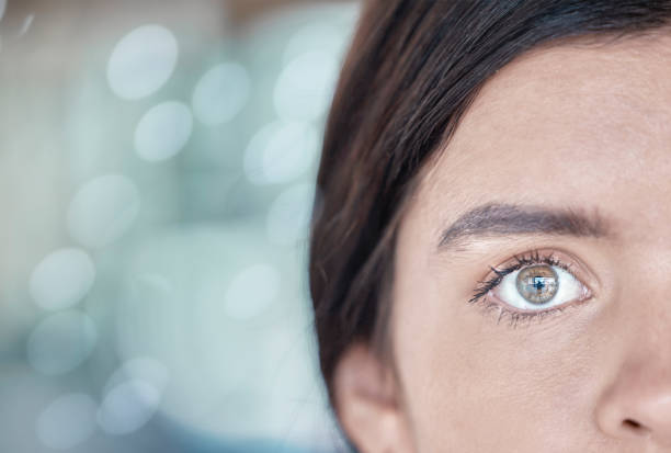 istock Eye, scan and mockup with a woman using cybersecurity or facial recognition software for safety. Future, ai and retina scanner with a female using technology to access the metaverse or virtual world 1493763622