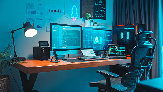 Desktop Computer of Programmer running AI machine learning software, AI innovation technology