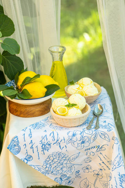istock Italian Toscana style table setting with ice cream and lemons. 1493769053