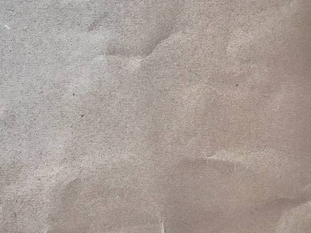 istock Close up of recycled brown crepe paper pattern texture background 1493769256