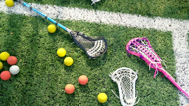 Top Close-Up View of Three Lacrosse Scoops Ready for Action