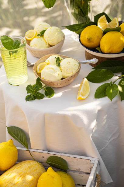 istock Vintage table setting with Linen napkins and yellow lemons. Decoration table. Close up. Cozy calm meal in the morning in the sunshine. 1493769320