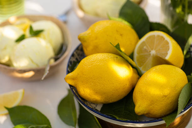istock Italian Toscana style table setting with ice cream and lemons. 1493769975