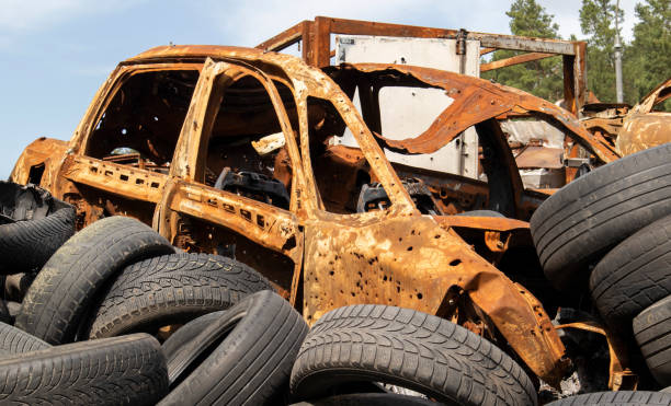 istock Garbage from a pile of black old car tires. Environmental pollution. Ecological problems. Old car tires thrown into an industrial landfill for recycling. Reuse of worn rubber tires. 1493770929