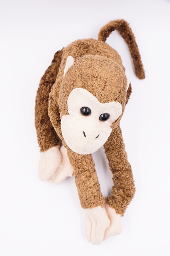 Brown hanging monkey soft toy