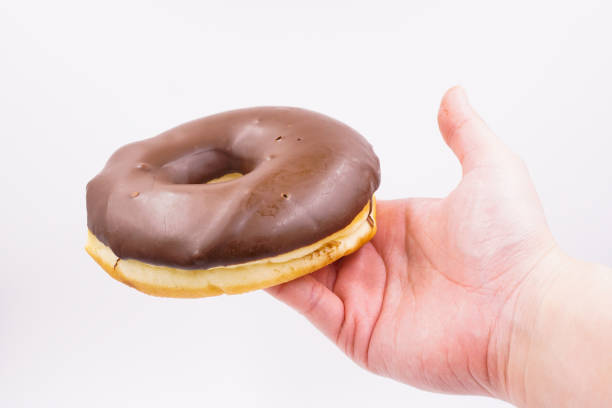 istock Yummy milk chocolate coated donut 1493771602