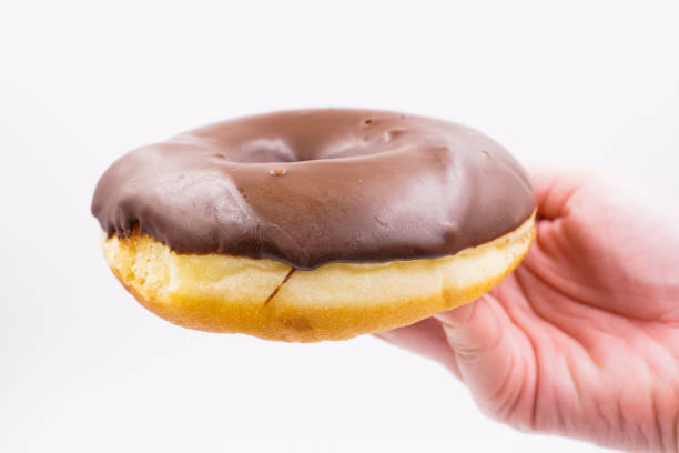 istock Yummy milk chocolate coated donut 1493771639