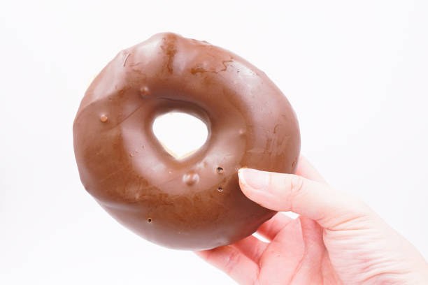 istock Yummy milk chocolate coated donut 1493771646