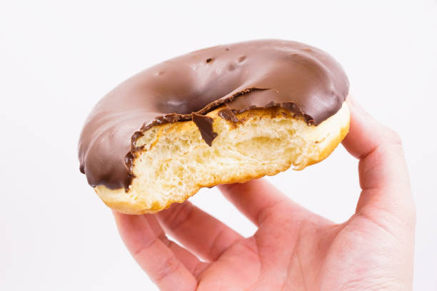 istock Yummy milk chocolate coated donut 1493771717