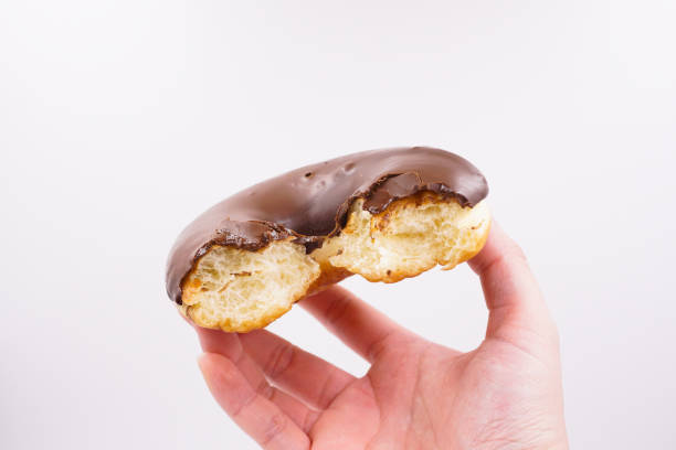 istock Yummy milk chocolate coated donut 1493771722