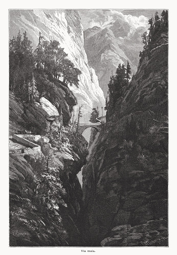 Historical view of the narrowest point of Viamala or Via Mala - a gorge along the river Hinterrhein between Zillis-Reischen and Thusis in the Canton of Graubünden, Switzerland, as well as the ancient and notorious pathway which traverses the gorge. Historically the Viamala was the most serious obstacle on the approach to the Splügen and San Bernardino mountain passes. Wood engraving after a drawing by Edward Theodore Compton (English painter, 1849 - 1921), published in 1877.