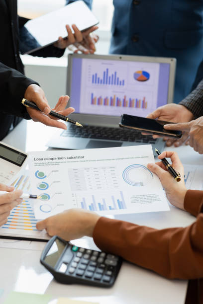 istock teamwork Business people are having a meeting to analyze data for business strategy planning. business idea 1493785566