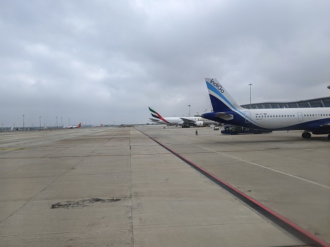Bangalore, India – December 27, 2022: The planes on the runway in Bangalore Kempegowda airport.
