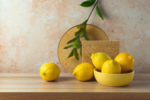 istock Summer creative modern still life composition with lemons on wooden table 1493789315