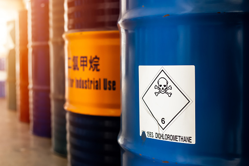 Label of toxicity, hazardous chemical warning symbol on the chemical barrel show caution for use. Industrial use and scientific research.