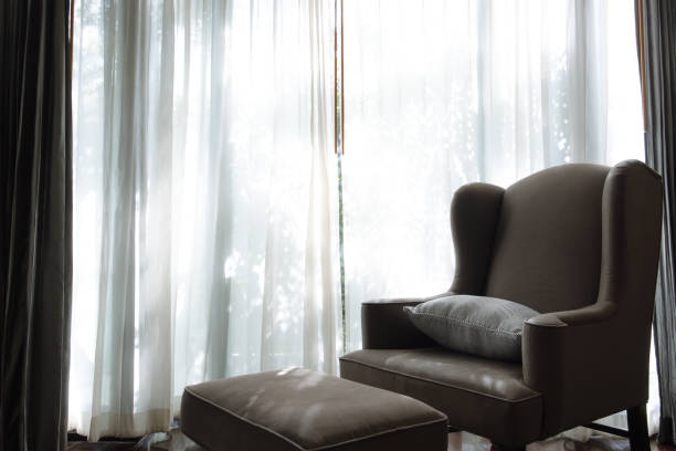 istock armchair with footstool inside room decorate 1493799586