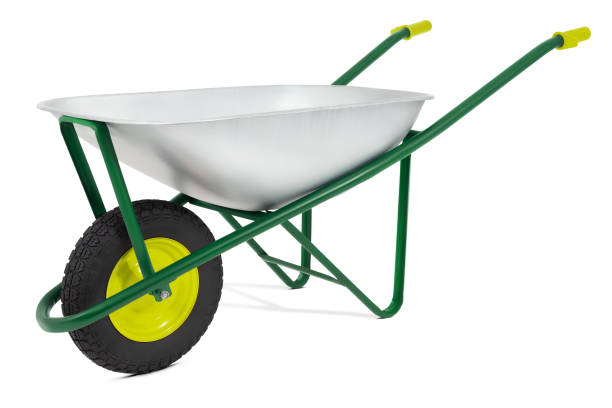 istock Wheelbarrow isolated on white background with clipping path. Gardening equipment tool for vegetable garden work or lawn and plant care. Spring concept, advertising banner for online shopping commerce 1493799684