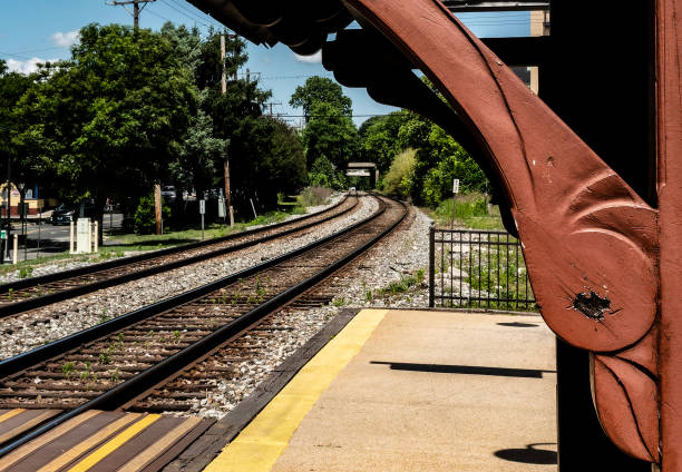istock Rail lines at a suburban train station 1493803007