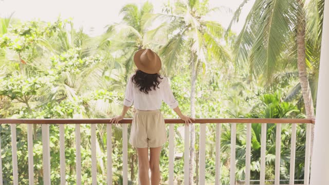 Slow Motion Arrival of Tourist Woman to Tropical Villa During Summer Vacation