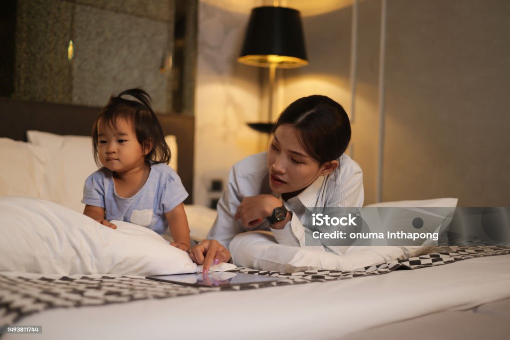 Mom Writing Note Young Working Mom Writing Notes While Embracing Her Daughter Stock ...