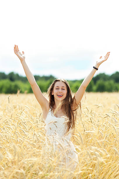 istock Woman with arms raised 149381495