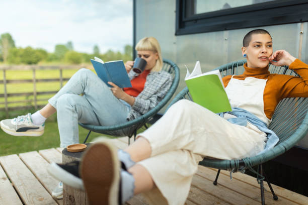 istock A loving couple enjoys reading books while sitting on the terrace 1493815132