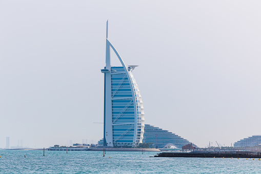 Dubai, United Arab Emirates - May 21 2023: Burj Al Arab Hotel in Dubai. The Burj Al Arab is a luxury 7 stars hotel built on an artificial island in front of Jumeirah beach.