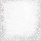 istock Winter gray background with snowflakes. 1493822981