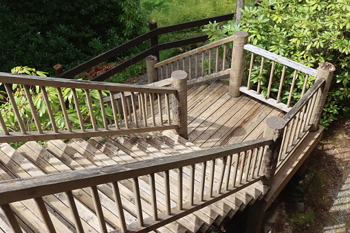 Wooden stairs and railings at the summer camp lodge