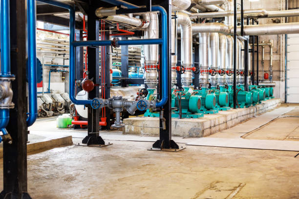 istock Heating plant pipes and machinery 1493827595