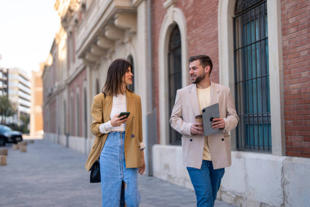 istock Successful company managers man and woman going home together after work 1493831519