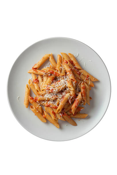 istock Pasta on a fork with tomatoes and cheese in a plate on a gray background 1493832751