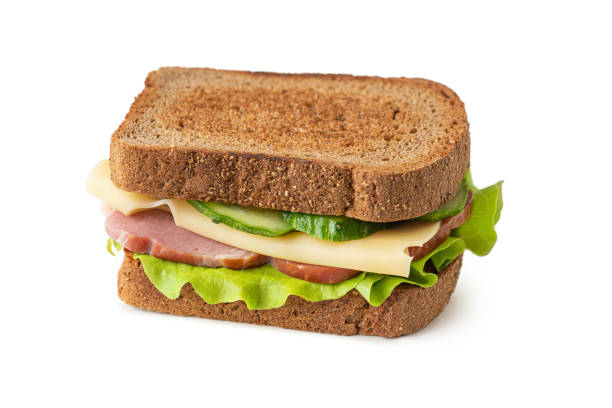 istock sandwich with meat, cheese and vegetables on a gray background 1493834295