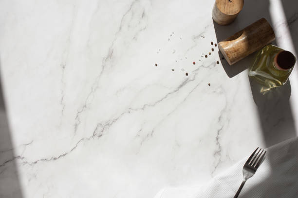 istock culinary series marble background with spices and cutlery 1493834436