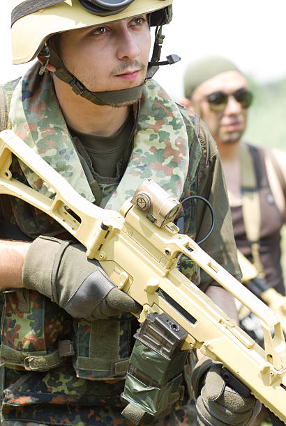 istock Two soldiers in full ammo outdoors 149384735