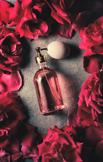 Bottle of perfume isolated over a white background. 