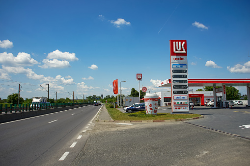 Tunari, Romania - Mai 24, 2023: A Lukoil gas station is seen on the Bucharest ring road (DMCB). This image is for editorial use only.