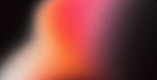 istock Color gradient dark grainy background, red orange white vibrant abstract spots on black, noise texture effect 1493866411