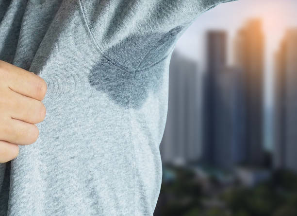istock Man with wet armpits in the city 1493891456