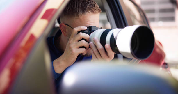 istock Private Spy In Car Taking Photos 1493900392