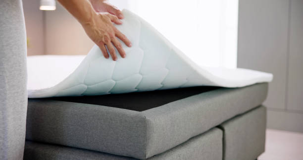 istock Mattress Topper Being Laid On Top 1493900494