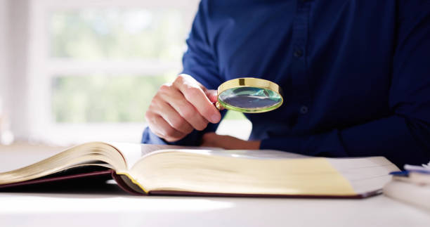 istock Lawyer Law Book With Magnifying Glass 1493901930