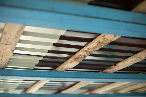 Roof from inside. Ceiling details. Chipped roof. Details Architecture.