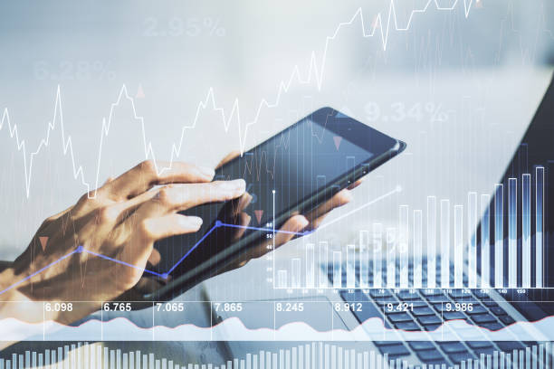 istock Abstract creative financial graph with finger clicks on a digital tablet on background, financial and trading concept. Multiexposure 1493910090